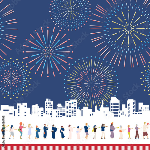 街並みと打ち上げ花火を背景に多国籍な盆踊りに参加する人たち