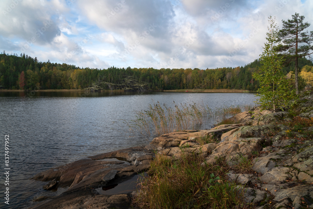 View from the shore of Lake Ladoga near the village of Lumivaara on a sunny autumn day, Ladoga skerries, Lahdenpohya, Republic of Karelia, Russia View from the shore of Lake Ladoga near the village of Lumivaara on a sunny autumn day, Ladoga skerries, Lahdenpohya, Republic of Karelia, Russia
