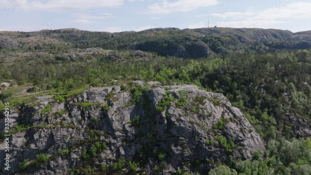 Drone shot showing the summit of Stoltzekleiven and Sandviksfjellet in Bergen, Norway. Beautiful summer day. Drone shot showing the summit of Stoltzekleiven and Sandviksfjellet in Bergen, Norway. Beautiful summer day.