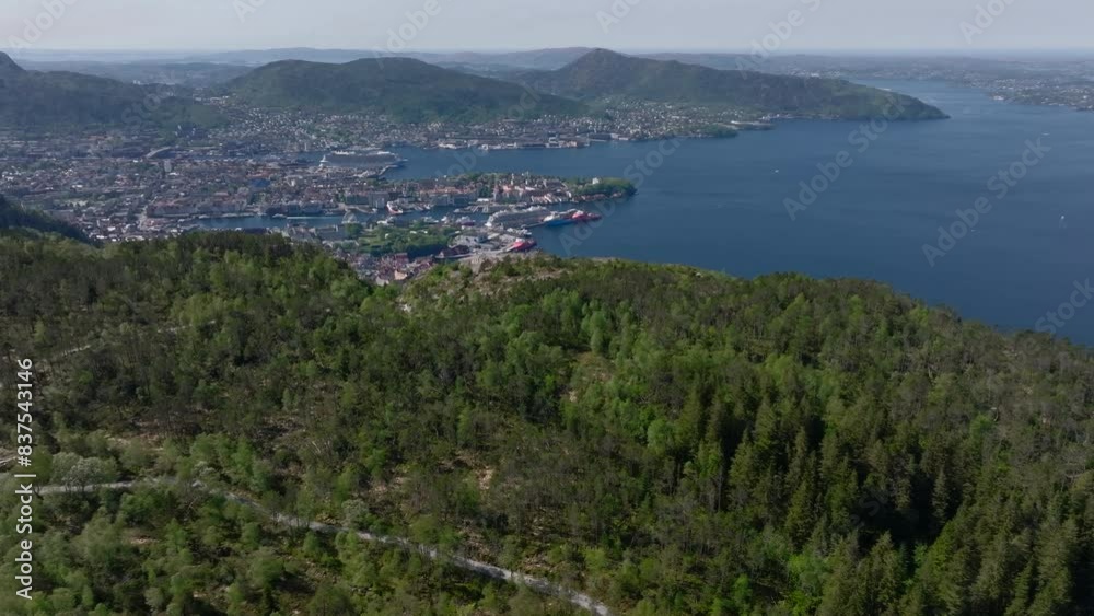 Beautiful drone shot from the summit of Sandviksfjellet with a beautiful view towards Bergen, the fjord and the surrounding mountains Beautiful drone shot from the summit of Sandviksfjellet with a beautiful view towards Bergen, the fjord and the surrounding mountains