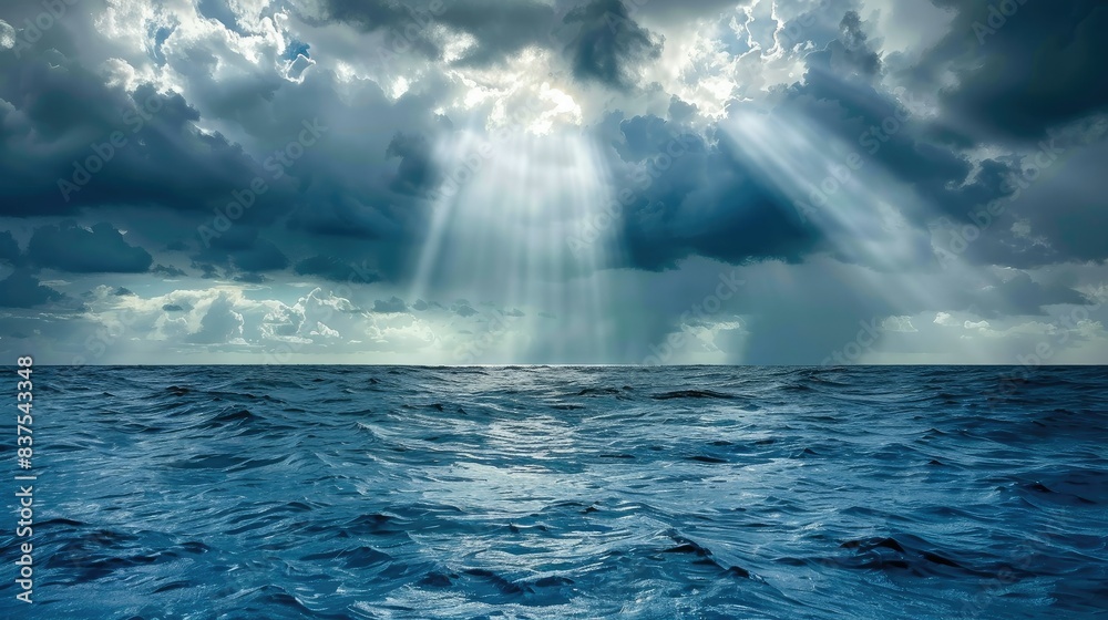 Sun rays from the clouds reflecting off calm sea surface. Suitable for wallpaper and nature related contents. Sun rays from the clouds reflecting off calm sea surface. Suitable for wallpaper and nature related contents.
