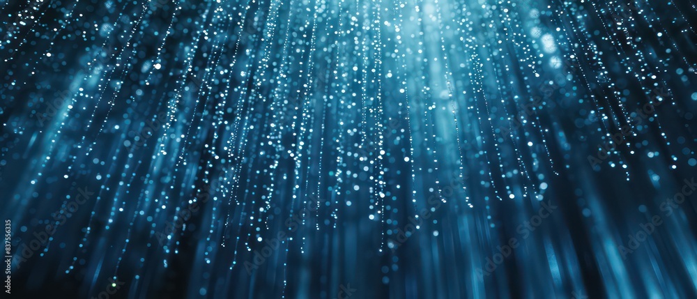 Naklejka premium Pastel blue rain lines text on a dark dotted backdrop, creating a serene, mysterious atmosphere