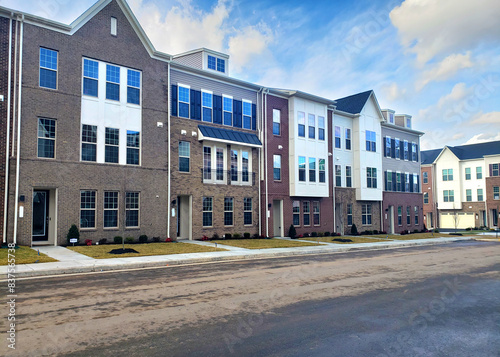 Modern city townhouses. Residential buildings with several floors.