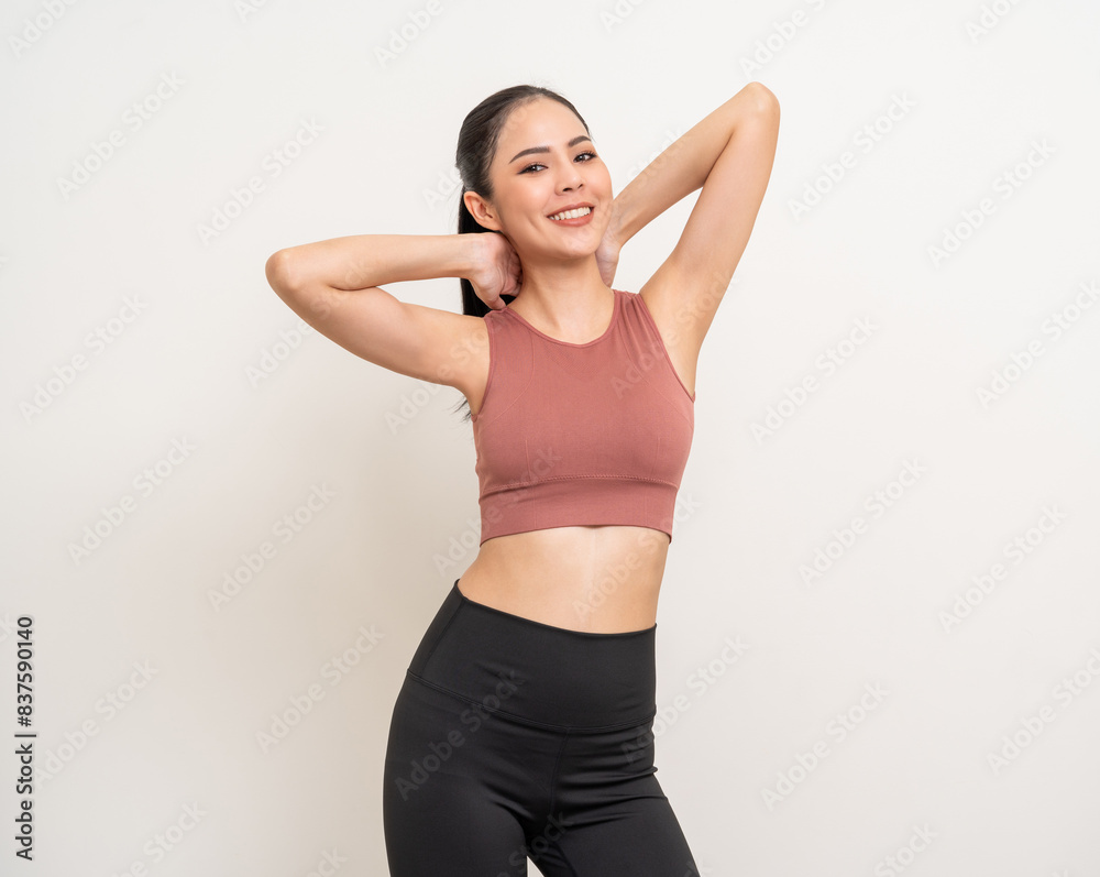 Young beautiful smiling asian woman with sportswear on isolated white background. Portrait happy healthy slim fit and firm latin attractive sporty woman standing pose exercise workout in studio. Young beautiful smiling asian woman with sportswear on isolated white background. Portrait happy healthy slim fit and firm latin attractive sporty woman standing pose exercise workout in studio.