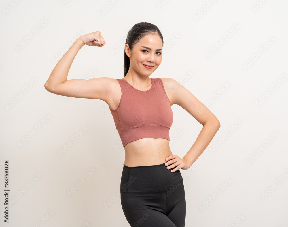 Young beautiful smiling asian woman with sportswear on isolated white background. Portrait happy healthy slim fit and firm latin attractive sporty woman standing pose exercise workout in studio. Young beautiful smiling asian woman with sportswear on isolated white background. Portrait happy healthy slim fit and firm latin attractive sporty woman standing pose exercise workout in studio.