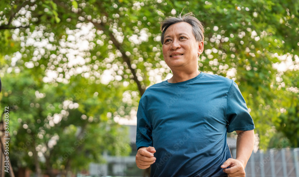 Senior old man runner exercise outdoor nature park. fitness man jogging wearing sportswear. Mature athlete man in sportswear Workout running at public park. Health and activity old man lifestyle Senior old man runner exercise outdoor nature park. fitness man jogging wearing sportswear. Mature athlete man in sportswear Workout running at public park. Health and activity old man lifestyle
