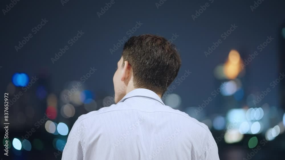 Confident light skin male standing by the river looking at beautiful city night view, late night contemplation, admiring urban night light, stay relief and relax inside the big city, planning vision Confident light skin male standing by the river looking at beautiful city night view, late night contemplation, admiring urban night light, stay relief and relax inside the big city, planning vision
