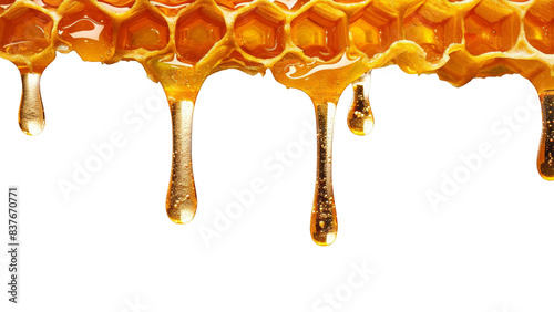 Close-up of golden honey dripping from honeycomb.  Sweet, natural, and delicious.