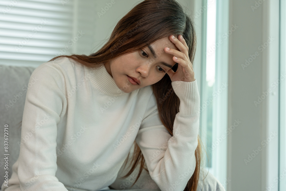Depression and mental illness. Asian woman disappointed, sad after receiving bad news. Stressed girl confused with unhappy problems, arguing with boyfriend, cry and worry about unexpected pregnancy. Depression and mental illness. Asian woman disappointed, sad after receiving bad news. Stressed girl confused with unhappy problems, arguing with boyfriend, cry and worry about unexpected pregnancy.