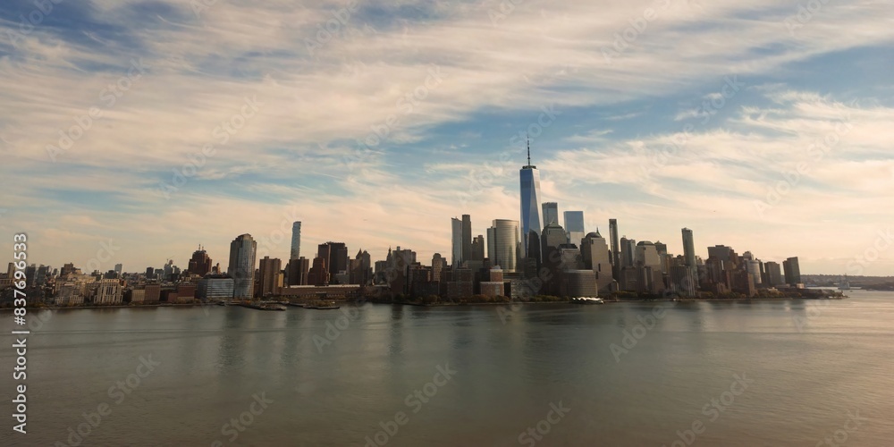 Naklejka premium New York skyline landmarks skyscrapers. Travel to America. New York, USA. View of Manhattan in New York. New York City, USA midtown Manhattan financial district skyline.