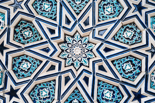 ceramic tile Uzbek mosaic with oriental Arabic Islamic pattern decorated with blue and white floral ornament with stars