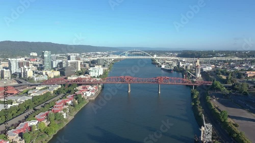 Drone flying towards Broadway Bridge and Fremont Bridge in Portland, Oregon. Nice summer day. photo