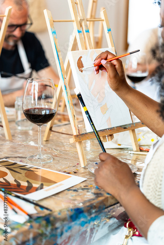 Fototapeta Naklejka Na Ścianę i Meble -  Sip and Paint Event. Social painting class with wine and good times