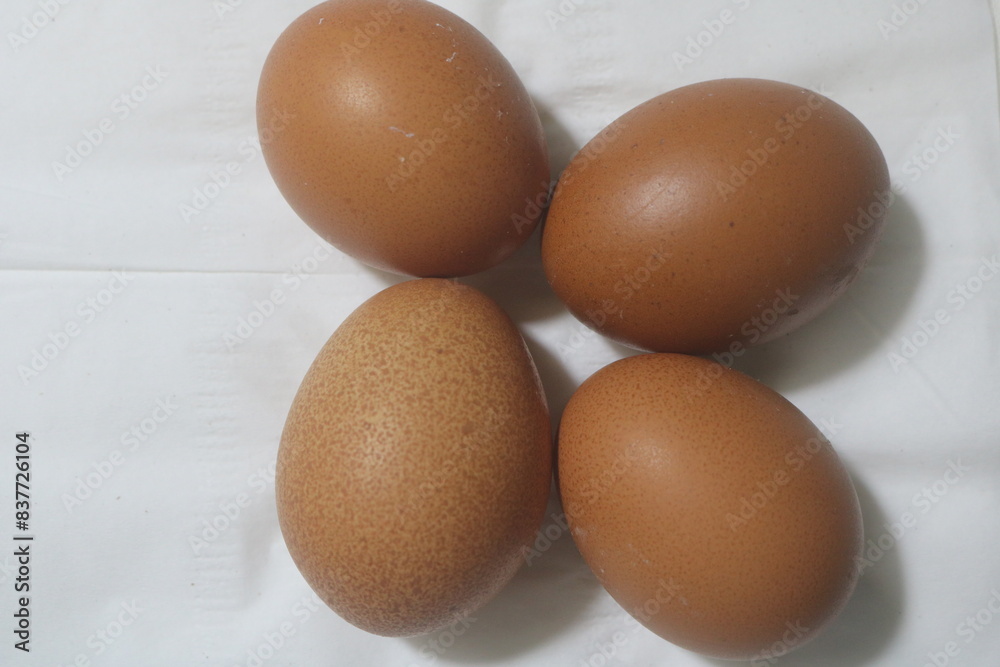 Fresh raw chicken eggs are placed in rows. Cover with tissue and water. in cardboard containers. Chicken eggs are healthy for the body. high nutritional value Fresh raw chicken eggs are placed in rows. Cover with tissue and water. in cardboard containers. Chicken eggs are healthy for the body. high nutritional value
