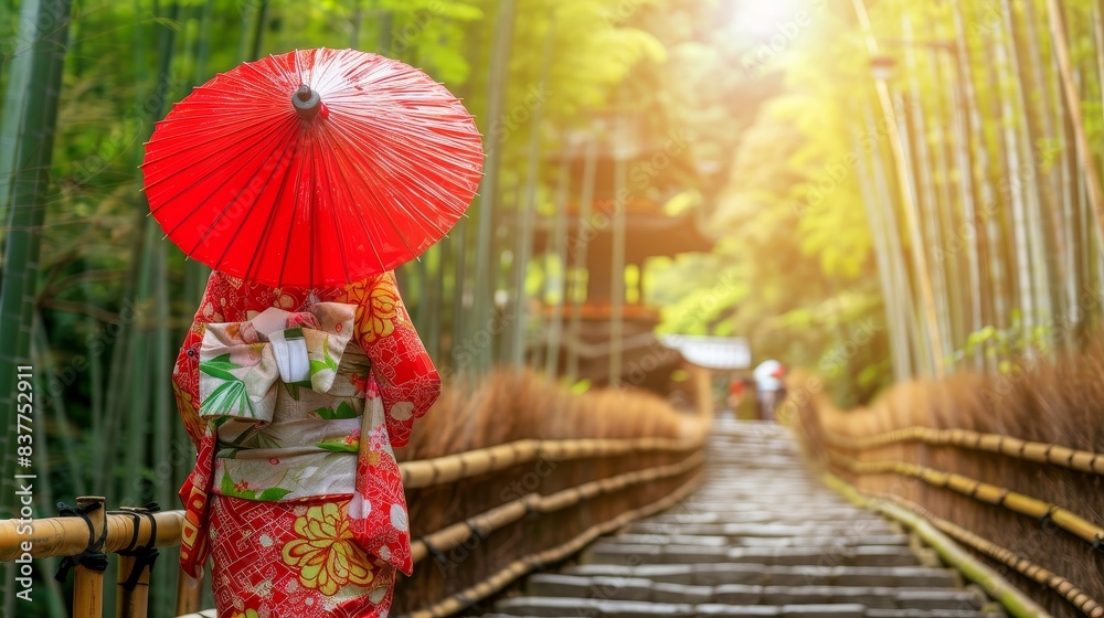 Fototapeta premium A woman wearing a red kimono