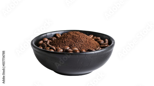 A black bowl filled with ground coffee and whole coffee beans isolated against a white background © momina