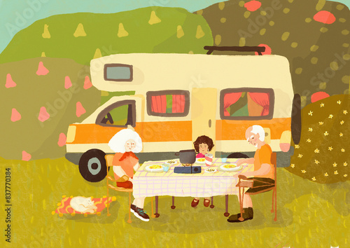 Grandparents with granddaughter camping in front of camper trailer at forest photo