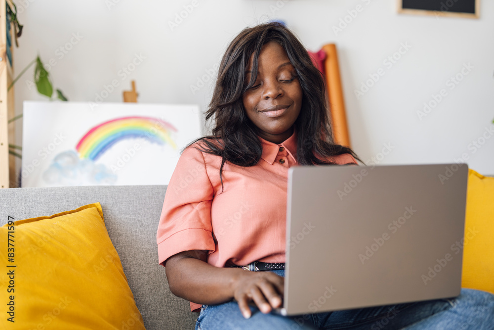 Freelancer working on laptop at home Freelancer working on laptop at home