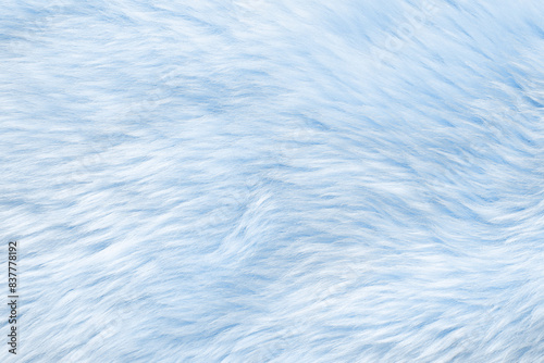Texture of light blue faux fur as background, closeup