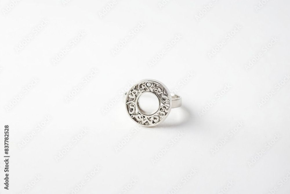 Silver Ring with Intricate Design on White Background Silver Ring with Intricate Design on White Background