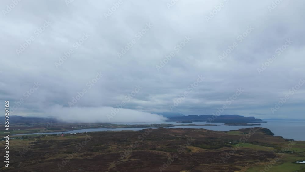 Cloud creation over Isle of Skye on a cloudy summer day in Scotland. Aerial dolly view Cloud creation over Isle of Skye on a cloudy summer day in Scotland. Aerial dolly view