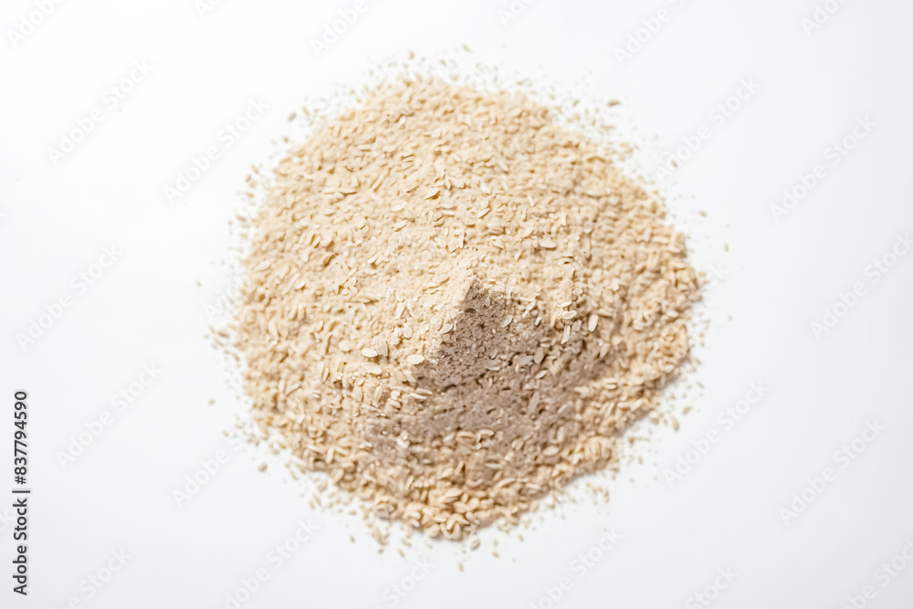 Close-up of a Heap of Rolled Oats on a White Surface Close-up of a Heap of Rolled Oats on a White Surface