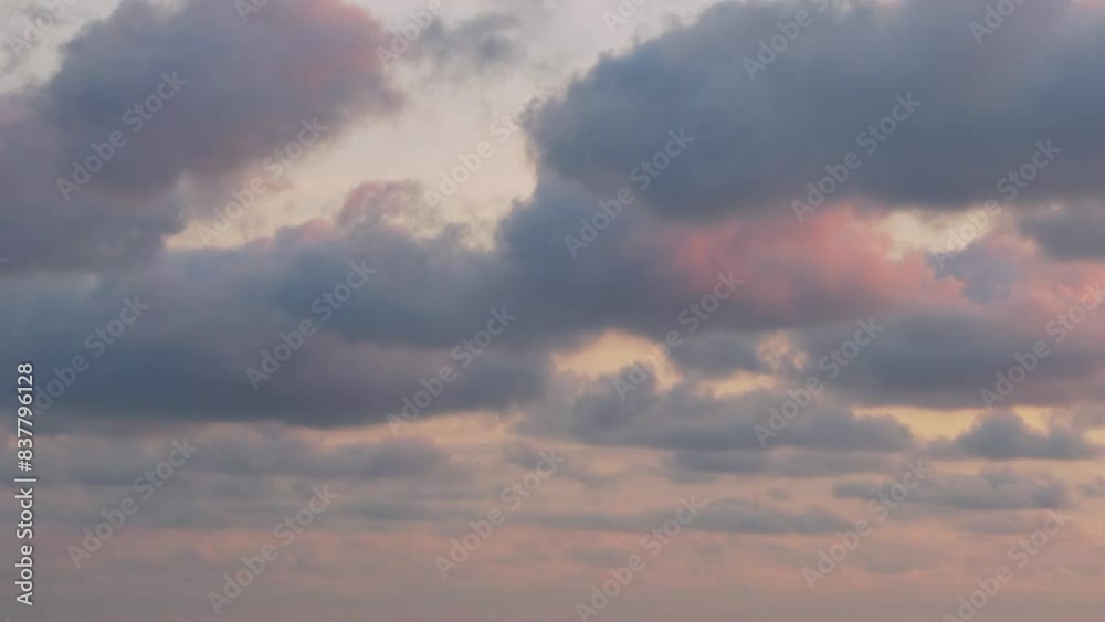 Colorful Blue Yellow Sunset Sky with Rain Purple Pink Lilac Clouds. Colored Storm Fluffy Clouds on a Amazing Skyscraper at Sunset in Sunlight. Beautiful Background, Tropical Incredible Sunset Sky. Colorful Blue Yellow Sunset Sky with Rain Purple Pink Lilac Clouds. Colored Storm Fluffy Clouds on a Amazing Skyscraper at Sunset in Sunlight. Beautiful Background, Tropical Incredible Sunset Sky.