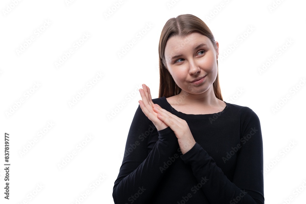 Close-up portrait of a cunning fair-haired 12 year old girl on a white background Close-up portrait of a cunning fair-haired 12 year old girl on a white background