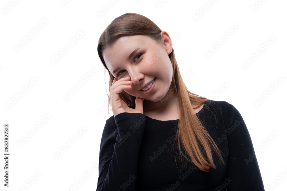 Portrait of a kind European schoolgirl on a white background with copyspace Portrait of a kind European schoolgirl on a white background with copyspace