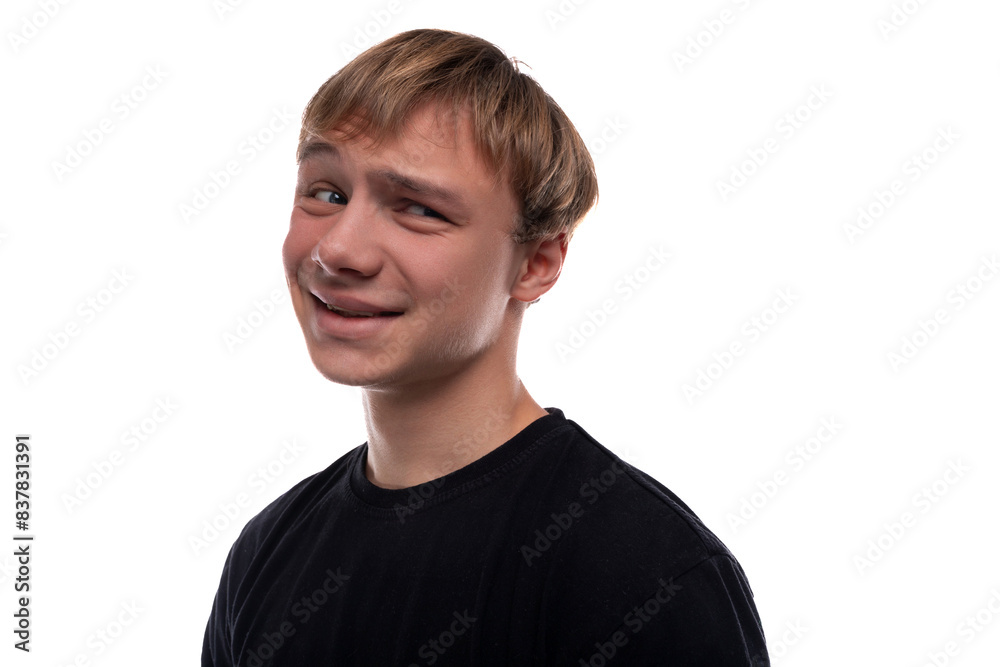 Blond teenager boy smiling on white background Blond teenager boy smiling on white background