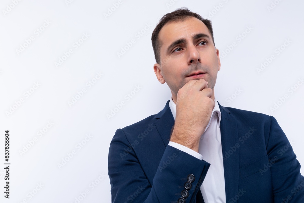 A 40-year-old brunette business man dressed in a blue jacket has doubts A 40-year-old brunette business man dressed in a blue jacket has doubts