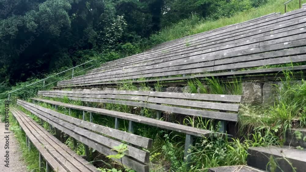 Wooden arena in a green area on a cloudy summer day Wooden arena in a green area on a cloudy summer day