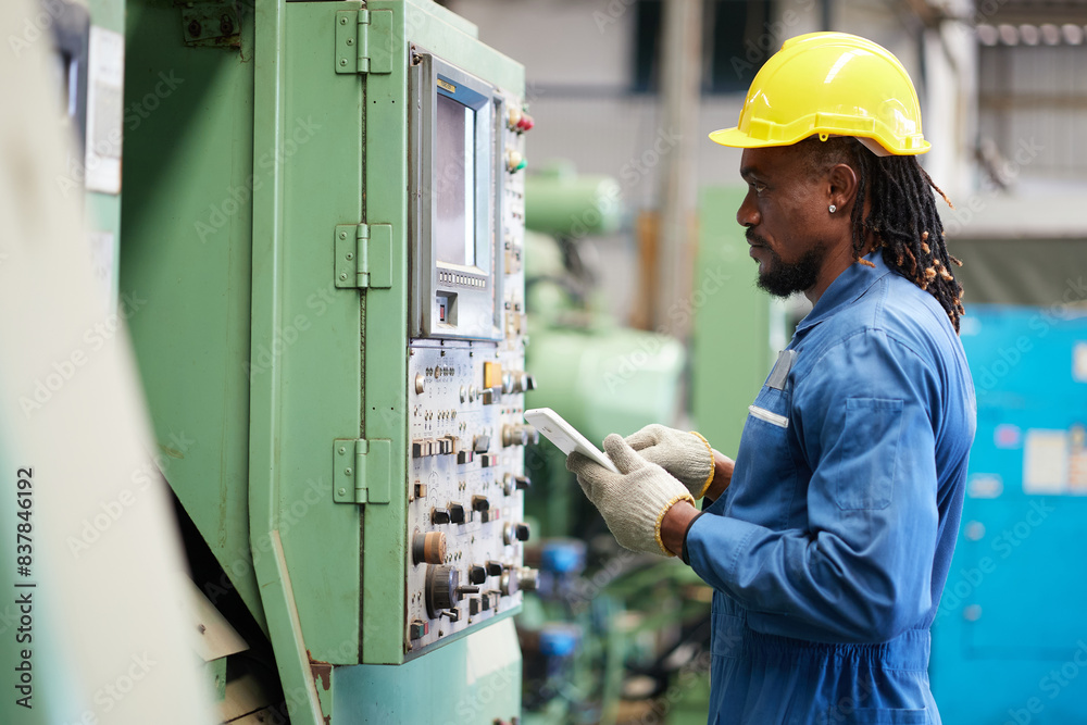 engineer or technician checking and control lathe machine in the factory engineer or technician checking and control lathe machine in the factory