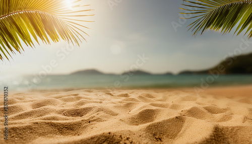 Magical sunny paradise beach with golden sand, palm leaves and sea background. Concept holiday. © Airobert