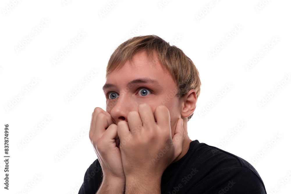 Portrait of an upset teenage guy with blond hair Portrait of an upset teenage guy with blond hair