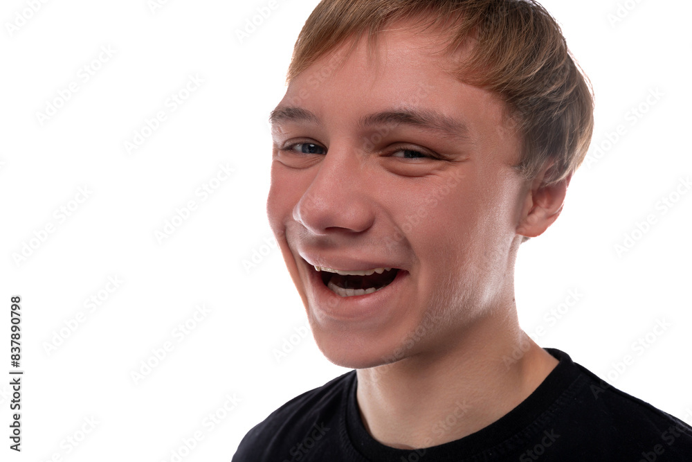 Close-up portrait of a blond teenager young man with kind eyes Close-up portrait of a blond teenager young man with kind eyes