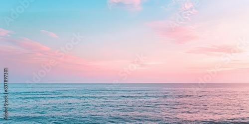 Beautiful ocean with a pink and blue sky background