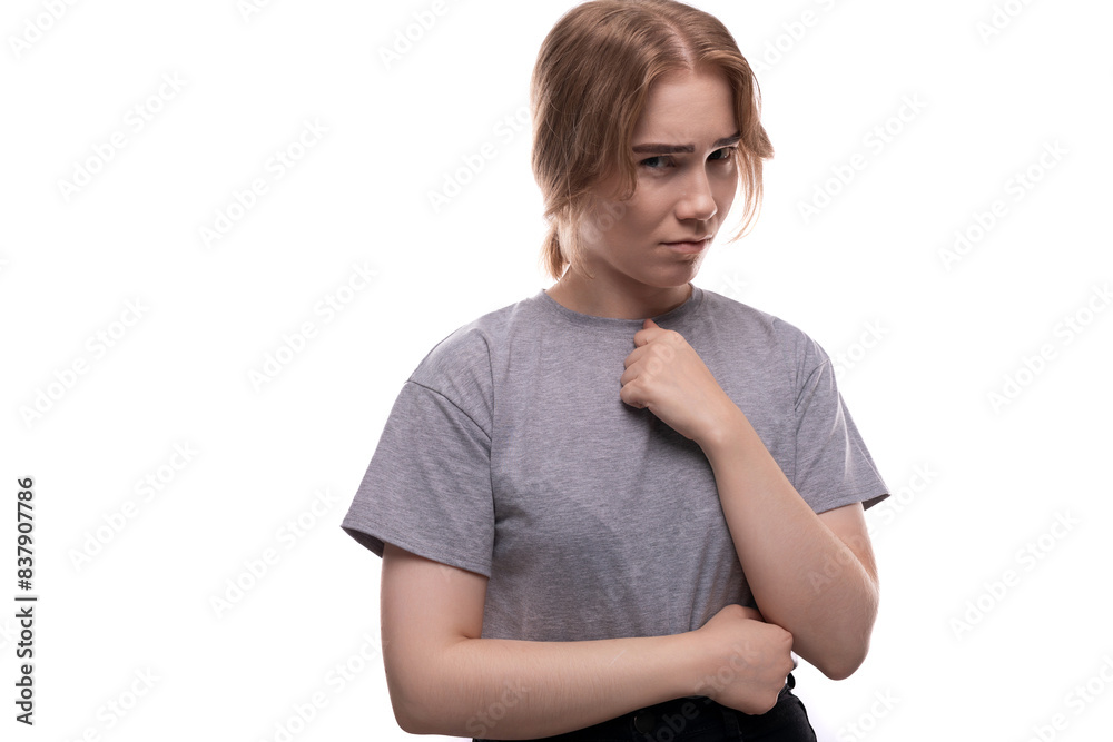 Teenage girl experiences doubts and mistrust on a white background Teenage girl experiences doubts and mistrust on a white background