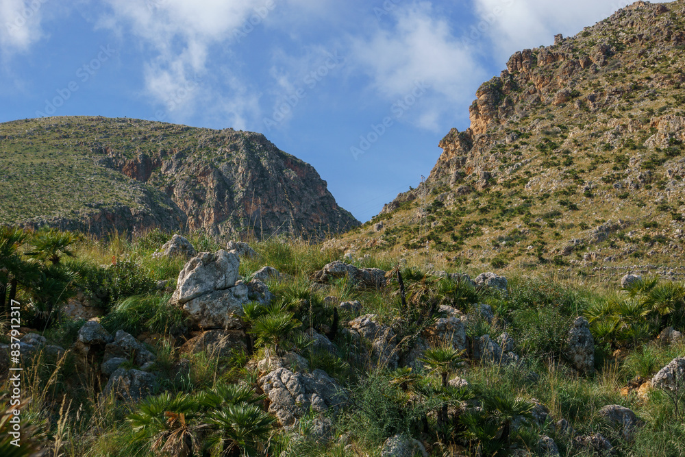 Naklejka premium Mountain landscape at the Zingaro Nature Reserve at the mediterranean sea, San Vito Lo Capo, Sicily, Italy