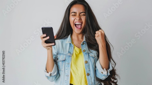 A happy woman celebrating victory