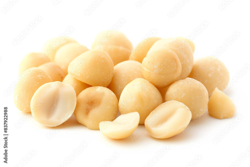 Close-up of shelled and unshelled Macadamia nuts isolated on a white background, showcasing their texture Close-up of shelled and unshelled Macadamia nuts isolated on a white background, showcasing their texture
