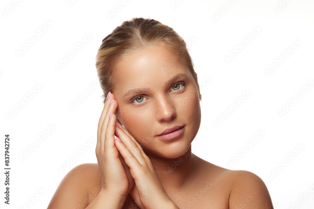 Portrait of beautiful natural young blonde woman with bare shoulders Portrait of beautiful natural young blonde woman with bare shoulders