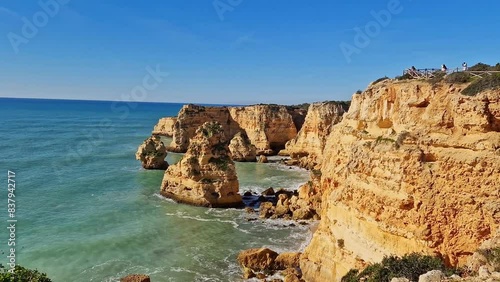 Praia da Marinha Beach among rock islets and cliffs seen from Seven Hanging Valleys Trail, Percurso dos Sete Vales Suspensos. Algarve, Portugal