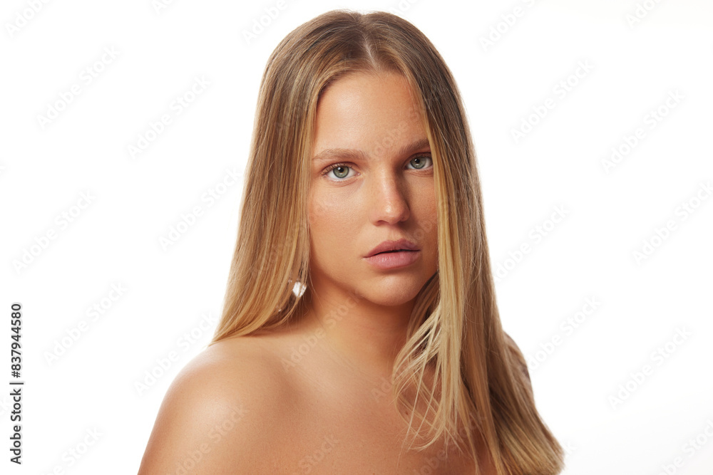Portrait of beautiful natural young blonde woman with bare shoulders Portrait of beautiful natural young blonde woman with bare shoulders