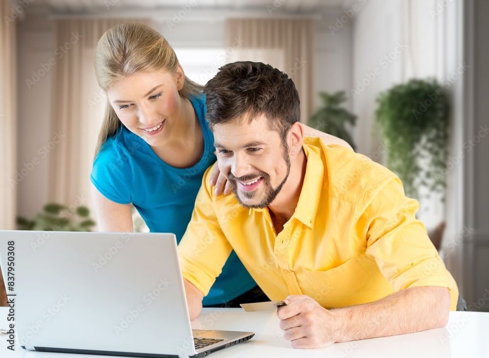 Stressful Couple with Laptop Computer in office Stressful Couple with Laptop Computer in office