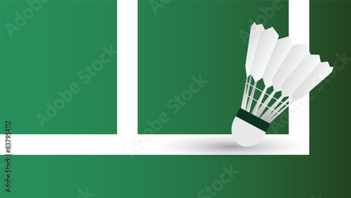 Shuttlecock on white line on green background badminton court indoor badminton sports wallpaper with copy space