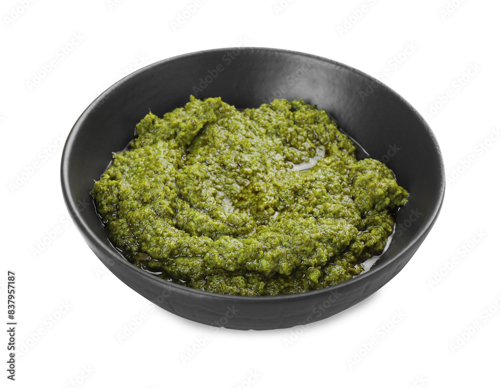 Fresh tasty pesto sauce isolated on white Fresh tasty pesto sauce isolated on white