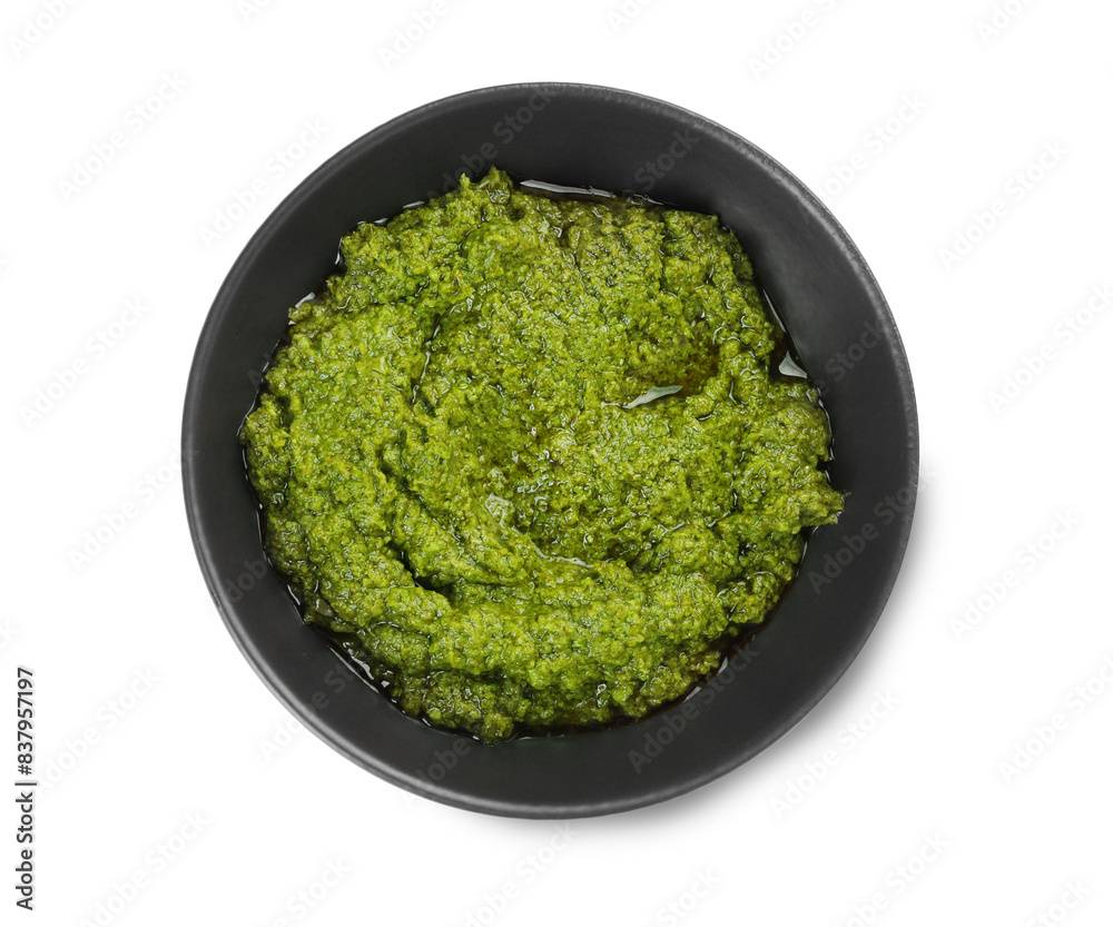 Fresh tasty pesto sauce isolated on white, top view Fresh tasty pesto sauce isolated on white, top view