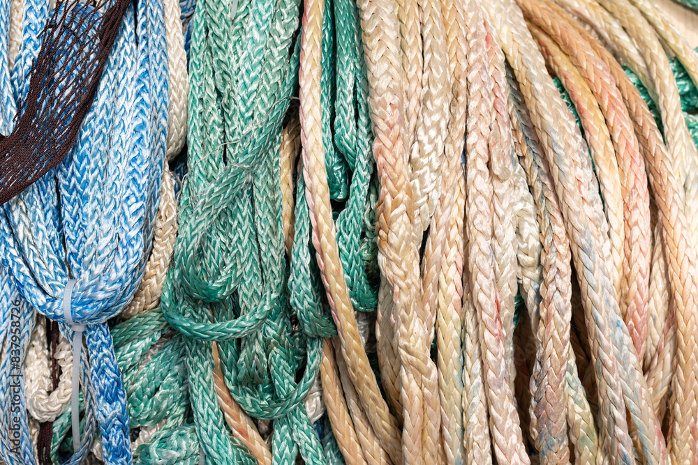 Assorted Group of recycled plastic ropes background. Full frame Assorted Group of recycled plastic ropes background. Full frame