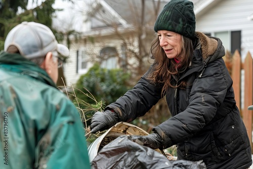 neighborly compassion woman assists elderly with waste disposal heartwarming community kindness scene photo